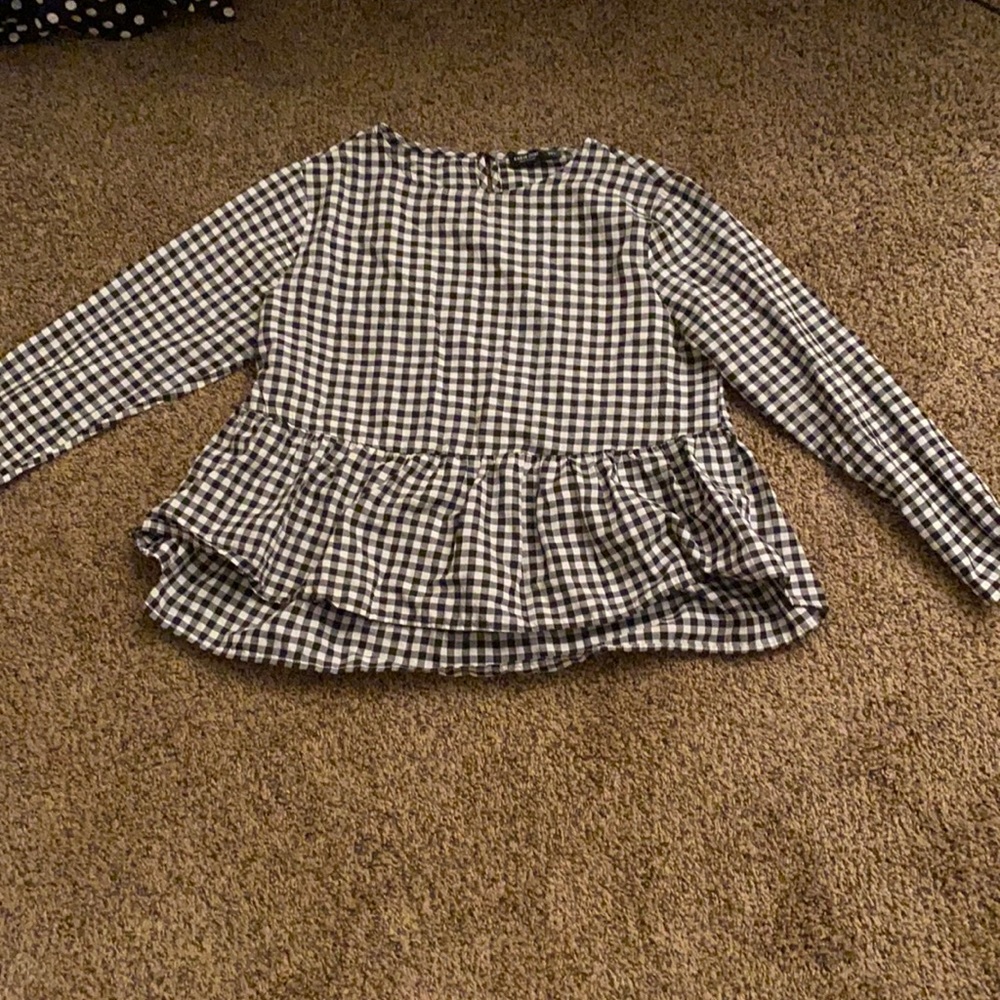 Black and white checkered blouse